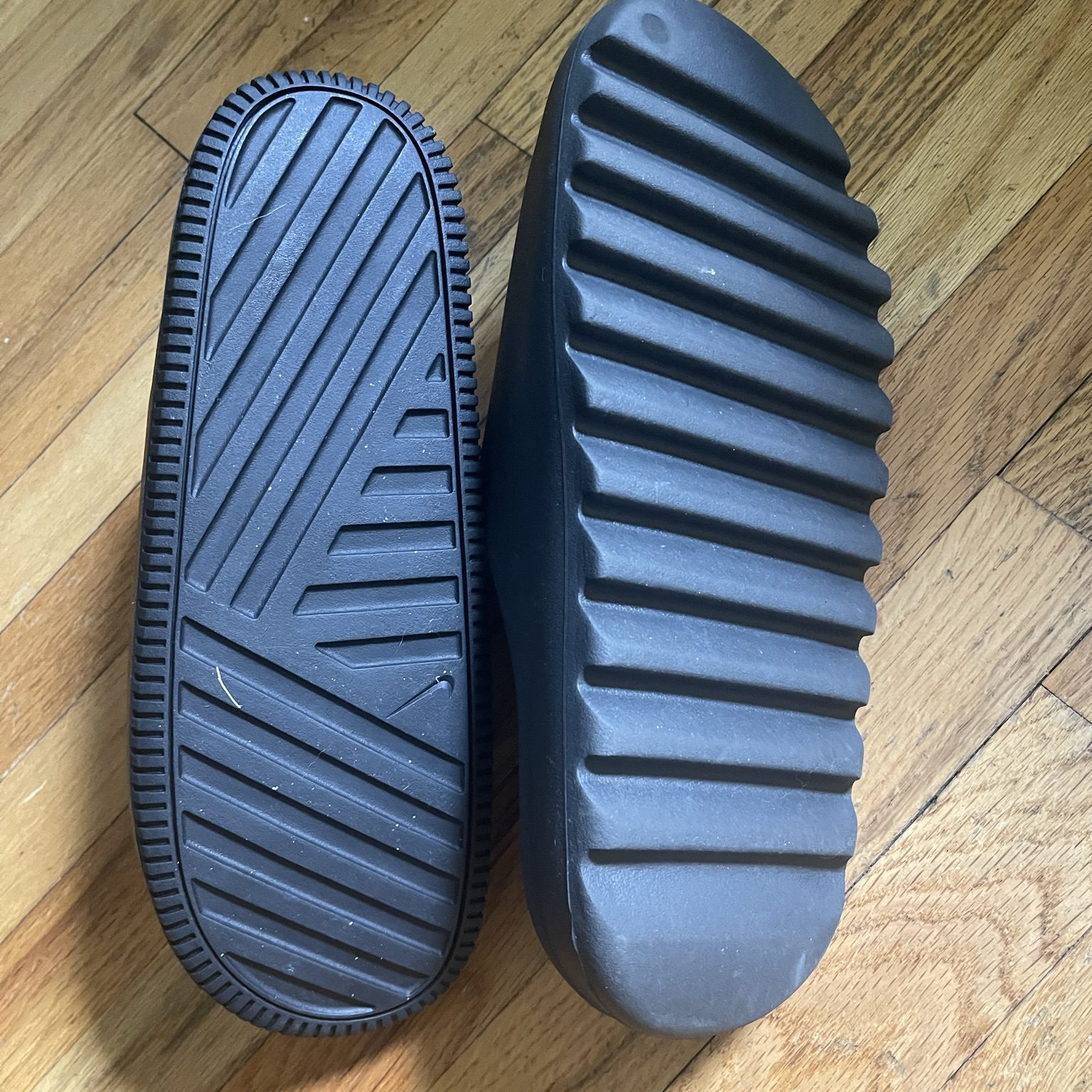bottoms of yeezy slides and bottoms of nike calm slides